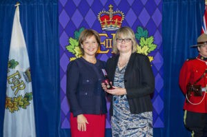 Jackie Kloosterboer receiving award from BC premier 2013